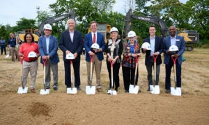 Leaders are shown with shovels at the groundbreaking for the Norton West Louisville Hospital, which is recruiting contractors for the construction.